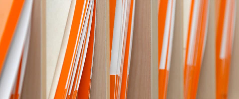 Close up of papers in a filing shelf