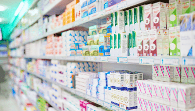 A pharmacy store with shelves of medication